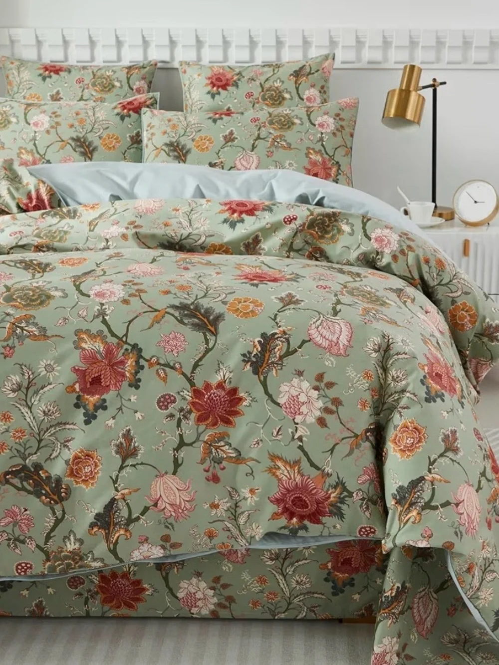 Floral Pastel Duvet Cover on a Light Moss Background with Pink-Coral Piping